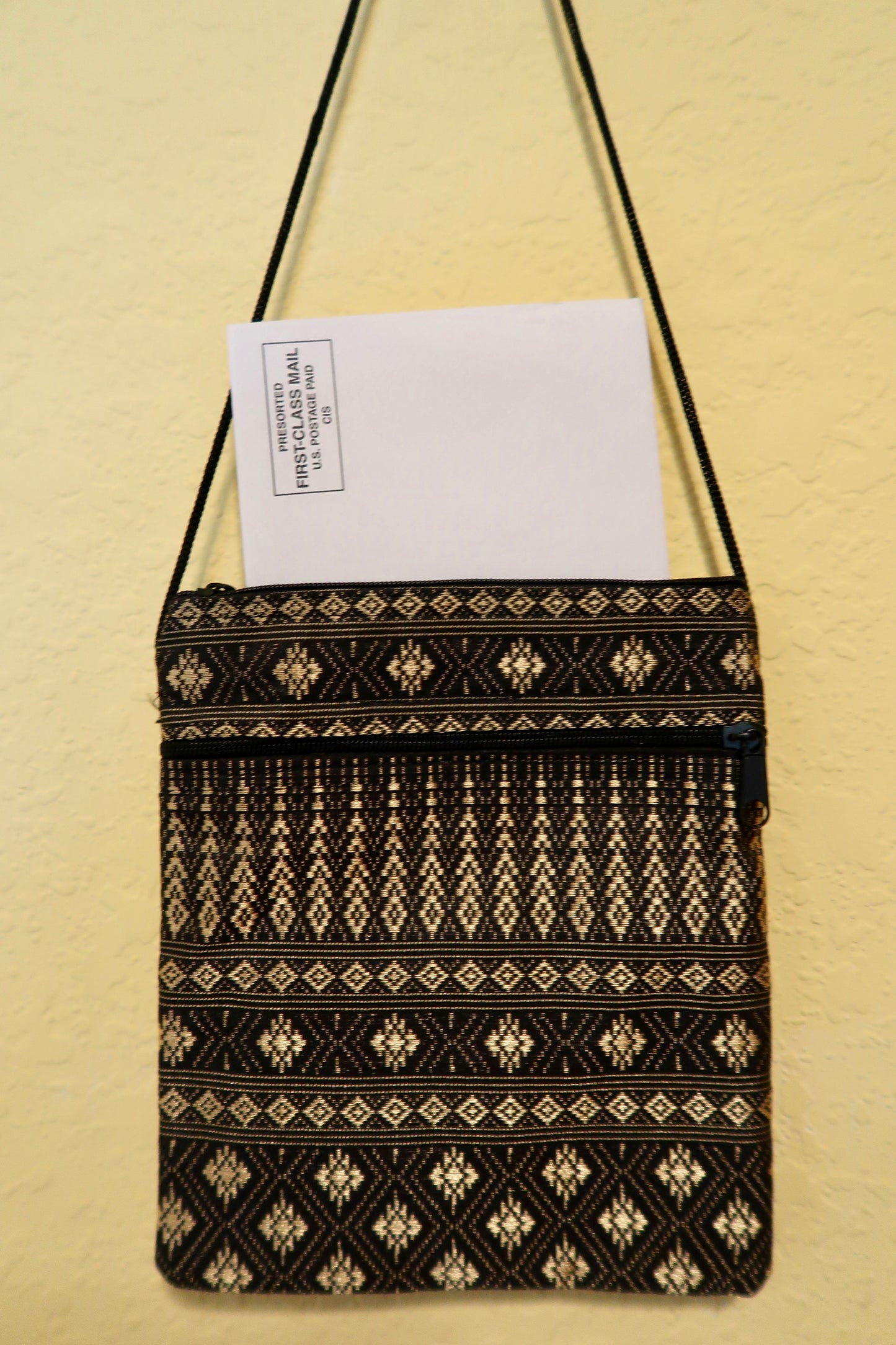 Sling bag, intricate pattern 